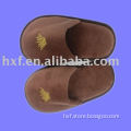 brown disposable hotel slippers